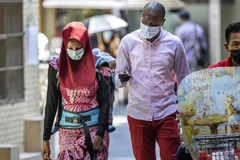 Những người phụ nữ da màu gánh chịu áp lực lớn. (Nguồn: EPA/EFE)