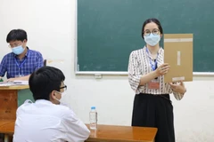 Thí sinh dự thi môn Ngoại ngữ. (Ảnh: Hoài Nam/Vietnam+)