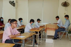 Thí sinh dự thi tốt nghiệp trung học phổ thông. (Ảnh: PV/Vietnam+)