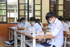 Thí sinh dự tốt nghiệp trung học phổ thông. (Ảnh: TTXVN)