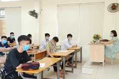 Thí sinh dự thi tốt nghiệp trung học phổ thông. (Ảnh: PV/Vietnam+)