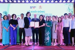 Lễ trao biên bản tại cuộc họp Ban Chỉ đạo Dự án GREAT 2 Sơn La. (Ảnh: Quang Quyết/TTXVN)