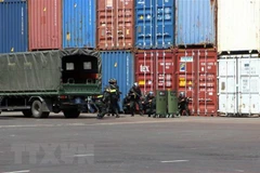 Diễn tập phòng chống khủng bố, bảo đảm an ninh cảng biển. (Ảnh: Đỗ Trưởng/TTXVN) 