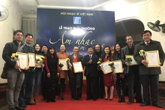 Các nhạc sỹ đoạt giải thưởng Âm nhạc của Hội Nhạc sỹ Việt Nam năm 2018. (Ảnh: Mỹ Bình/Vietnam+)