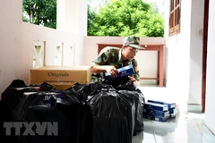 Tang vật một vụ buôn lậu thuốc lá. (Nguồn: TTXVN)