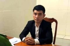 Đối tượng Trần Quang Khải tại Cơ quan Công an. (Nguồn: TTXVN)