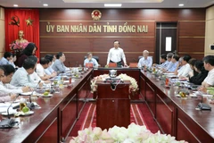 Bộ trưởng Bộ Tài chính Đinh Tiến Dũng, Phó Ban Chỉ đạo 389 quốc gia chủ trì buổi làm việc với lãnh đạo tỉnh Đồng Nai. (Ảnh: Sỹ Tuyên/TTXVN)