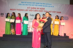 Những đóng góp của chị Trần Thị Trang được Đại sứ quán Việt Nam tại Malaysia ghi nhận. (Ảnh: Hoàng Nhương/Vietnam+)