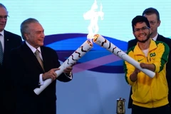 Buổi lễ rước đuốc Đại hội thể thao dành cho người khuyết tật. (Nguồn: AFP/TTXVN)