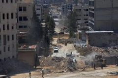 Quang cảnh cửa ngõ thành phố Bani Zeid sau khi lực lượng ủng hộ Chính phủ giành quyền kiểm soát Leramun, ngoại ô phía Tây Bắc của Aleppo. (Nguồn: AFP/TTXVN) 