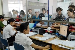 Cần tinh giản bộ máy hành chính cồng kềnh, kém hiệu quả. (Ảnh minh họa: TTXVN)