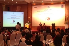 Lễ cam kết ủng hộ Những Nguyên tắc trao quyền cho phụ nữ. (Ảnh: Hồng Kiều/Vietnam+)