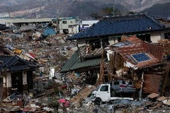 Cảnh đổ nát sau trận động đất hôm 11/3. (Nguồn: AFP/TTXVN)