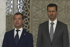 Tổng thống Nga Dmitry Medvedev và Tổng thống Syria Bashar al-Assad. (Nguồn: Reuters)
