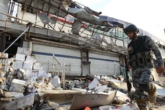 Hiện trường vụ đánh bom xe tại thủ đô Baghdad. (Nguồn: AFP/TTXVN)