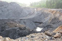 Hiện trường khai thác than trái phép quy mô lớn ở Hoành Bồ. (Nguồn: cand.com.vn)