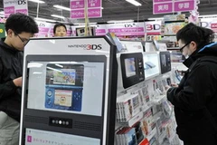 Người mua tìm đến Nintendo 3DS nhiều hơn sau khi giảm giá. (Nguồn: Getty Images)