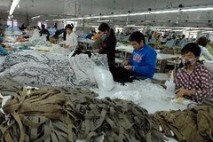 Dệt may vẫn là mặt hàng xuất khẩu có kim ngạch cao nhất. (Ảnh: Phạm Hậu/TTXVN)