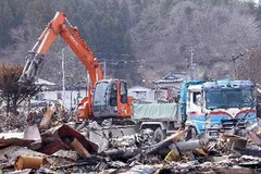 Nhật Bản ngổn ngang sau trận động đất ngày 11/3. (Nguồn: THX/TTXVN)