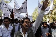 Người dân Afghanistan đổ ra các đường phố ở thủ đô Kabul phản đối vụ ám sát ông Rabbani. (Nguồn: Reuters)