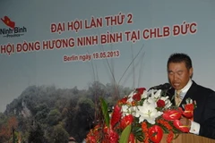 Ông Nguyễn Bình Định, Chủ tịch hội đọc báo cáo tổng kết. (Ảnh: Thanh Hải/Vietnam+) 