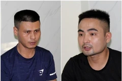 Hai đối tượng Hồ Ngọc Sao (trái) và Nguyễn Văn Thế bị bắt giữ để điều tra về hành vi “Giết người”. (Ảnh: TTXVN phát)