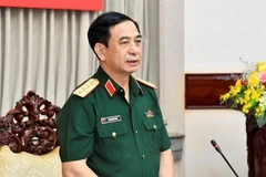 Đại tướng Phan Văn Giang, Bộ trưởng Bộ Quốc phòng phát biểu tại buổi làm việc. (Ảnh: TTXVN)
