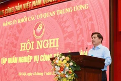 Ông Nguyễn Văn Thể, Ủy viên Trung ương Đảng, Bí thư Đảng ủy Khối các cơ quan Trung ương phát biểu khai mạc hội nghị. (Ảnh: Phương Hoa/TTXVN)