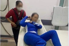  Nữ nhân viên sân golf BRG nhập viện điều trị sau khi bị ông Dũng hành hung. (Nguồn: Báo Thanh niên)