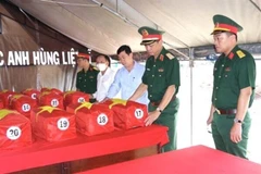  Đội quy tập hài cốt liệt sỹ Bộ Chỉ huy quân sự tỉnh Đồng Nai phát hiện và quy tập được 26 bộ hài cốt liệt sỹ tại ấp Bàu Bông, xã Phước An, huyện Nhơn Trạch, tỉnh Đồng Nai ngày 14/3/2022. (Ảnh: TTXVN pháp)