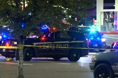 Cảnh sát Mỹ làm việc tại hiện trường vụ xả súngở phía Nam Seattle. (Nguồn: CNN)