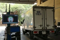 Xe đến đăng kiểm tại Trung tâm Đăng kiểm 62.01S, tại thành phố Tân An, tỉnh Long An. (Ảnh: Thanh Bình/TTXVN)