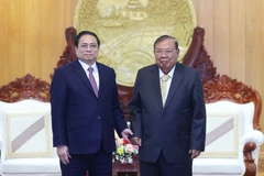 [Photo] Thủ tướng đến thăm các vị nguyên lãnh đạo nước CHDCND Lào