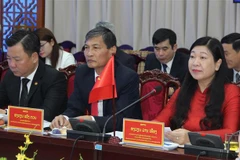 Đoàn đại biểu Ủy ban MTTQ Việt Nam thành phố Hà Nội tại buổi hội đàm. (Ảnh: Nguyễn Thắng/TTXVN)