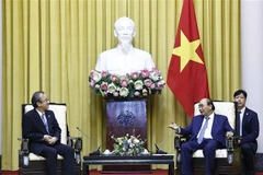 Chủ tịch nước Nguyễn Xuân Phúc tiếp ông Hanazumi Hideyo, Thống đốc tỉnh Niigata, Nhật Bản. (Ảnh: Thống Nhất/TTXVN)