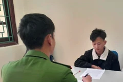 Đối tượng Giàng A Dũng đầu thú tại Cơ quan điều tra. (Ảnh: TTXVN phát)