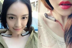 Trong hai ngày qua, cộng đồng mạng ở Trung Quốc đang 'phát sốt' với trào lưu đặt những đồng tiền xu lên xương quai xanh, một cách lạ lùng để chứng minh rằng mình có thân hình mảnh mai quyến rũ. (Nguồn: CCTVNews)