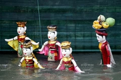 [Photo] Ghé thăm rạp múa rối nước ngoài trời ở làng Đào Thục