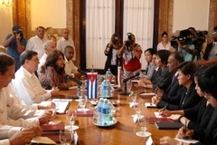 Một cuộc họp giữa Cuba và Singapore tại La Habana. (Nguồn: THX/TTXVN)
