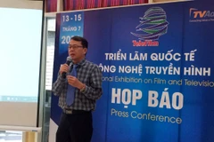 Ông Nguyễn Hà Nam giới thiệu về triển lãm tại họp báo chiều nay. (Ảnh: PV/Vietnam+)