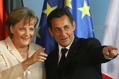 Tổng thống Pháp Nicolas Sarkozy và Thủ tướng Đức Angela Merkel (Ảnh: AFP)