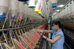  GDP tăng trưởng 5,18% trong sáu tháng của năm 2014. (Ảnh minh họa. Nguồn: TTXVN) 