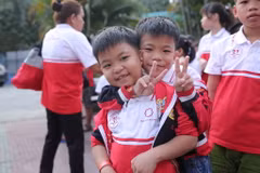 Chương trình đã mang Tết đến gần hơn với hàng ngàn em nhỏ có hoàn cảnh khó khăn. (Ảnh: PV//Vietnam+)