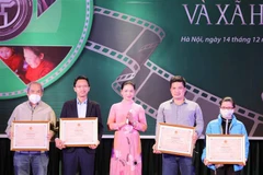 TTXVN đoạt giải cao Cuộc thi ảnh “Phụ nữ với gia đình và xã hội"