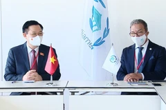 Chủ tịch Quốc hội Vương Đình Huệ gặp Chủ tịch Liên minh Nghị viện Thế giới Duarte Pacheco. (Ảnh: TTXVN)