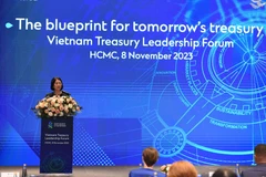 Bà Michele Wee, Tổng Giám đốc Ngân hàng Standard Chartered Việt Nam phát biểu tại Diễn đàn. (Ảnh: PV/Vietnam+)