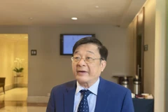 Tiến sỹ Nguyễn Quốc Hùng - Phó Chủ tịch kiêm Tổng thư ký Hiệp hội Ngân hàng Việt Nam trả lời phỏng vấn báo chí. (Ảnh: PV/Vietnam+)
