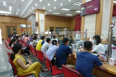 Agribank dành 18 tỷ đồng tặng khách hàng tiết kiệm dự thưởng Tết. (Ảnh: Vietnam+)