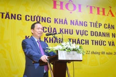 Phó Thống đốc Thường trực Ngân hàng Nhà nước Đào Minh Tú phát biểu tại hội thảo. (Ảnh: PV/Vietnam+)