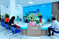 Giao dịch tại VietinBank. (Ảnh: Vietnam+)